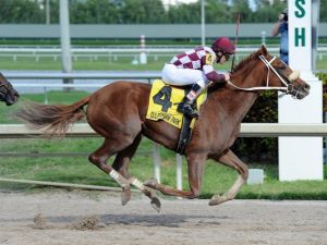 Flora Dora winning the My Dear Girl Stakes (photo from the Courier-Journal)