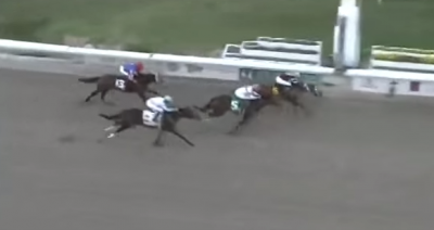 Gun Runner (inside) holds off Forevamo (middle) and Mo Tom (outside) in the Risen Star Stakes.