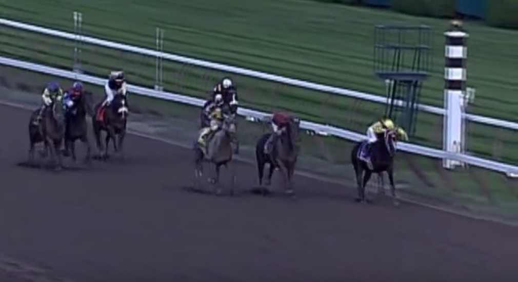 Rachel Alexandra holds of Macho Again in the 2009 Woodward Stakes.