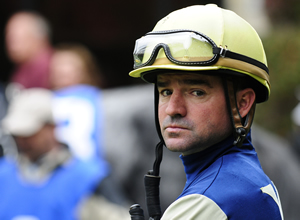 Jockey Kent Desormeaux guided brother Keith's Exaggerator to victory in the Santa Anita Derby.