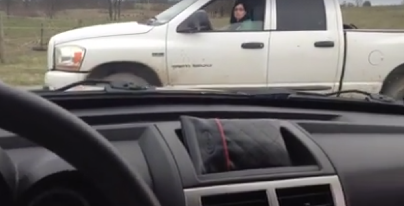 A pickup truck, allegedly driven by Maria Borell, blocks Kara Harrison’s access to Colby Fields, which Borell was leasing. Borell claimed that the impromptu visit was a violation of state law, while Harrison countered that the lease agreement gave her permission to inspect the property at any time.