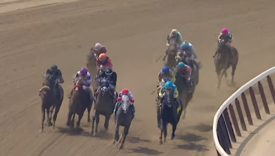 The field turns for home in the 2016 Woody Stephens on the Belmont Stakes undercard.