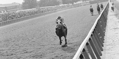 Secretariat, with jockey Ron Turcotte up, powers his way to victory in the Belmont Stakes at Belmont Park on June 9, 1973 to become the first horse since Citation in 1948 to win the Triple Crown (AP photo).