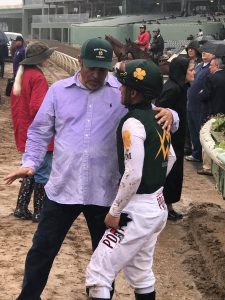 Trainer Mick Ruis and jockey Javier Castellano discuss the disqualification of rival McKinzie (photo by Margaret Ransom). 
